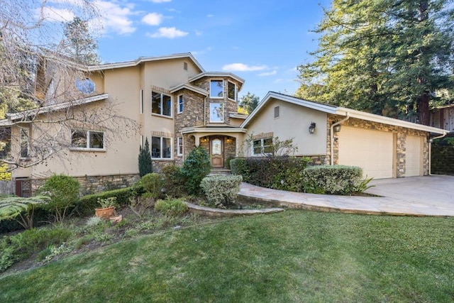 view of front facade with a garage and a front lawn