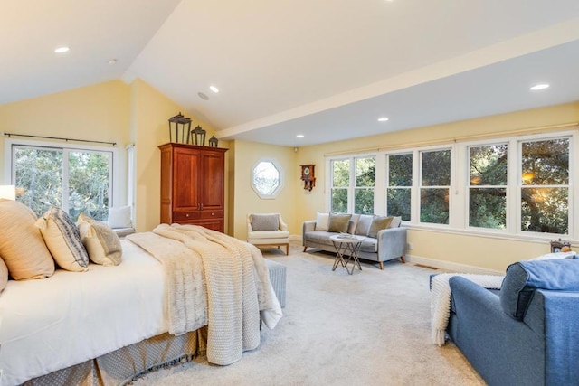 carpeted bedroom with vaulted ceiling