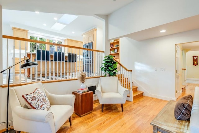 living area featuring light hardwood / wood-style floors