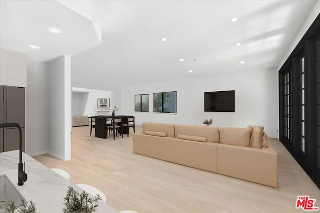 living room featuring light hardwood / wood-style floors