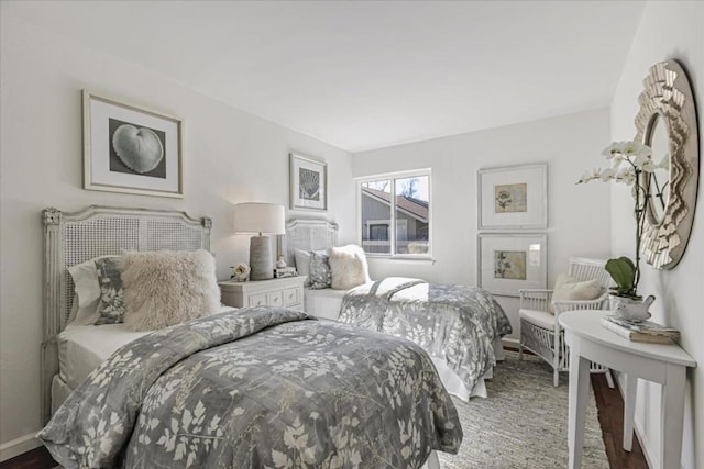 bedroom featuring wood-type flooring