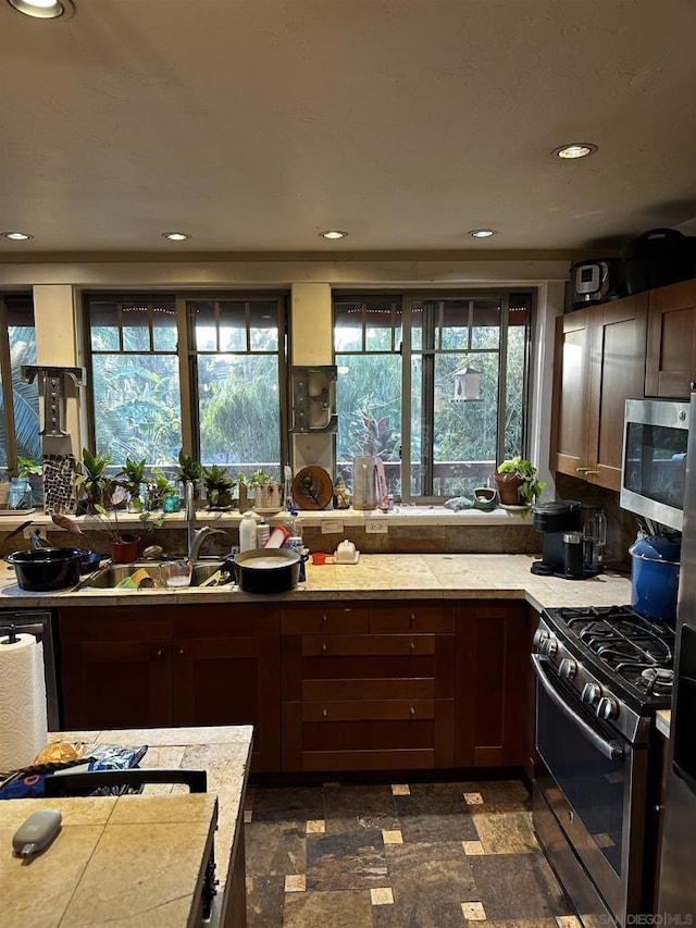 kitchen with appliances with stainless steel finishes and sink