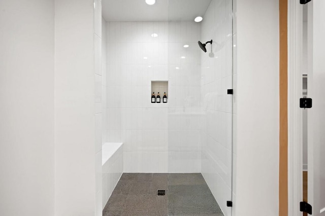 bathroom with a shower with shower door