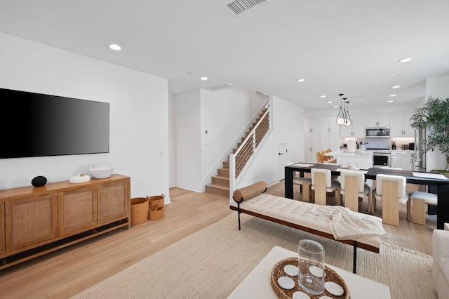 living room featuring light hardwood / wood-style flooring