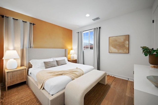 bedroom featuring hardwood / wood-style flooring