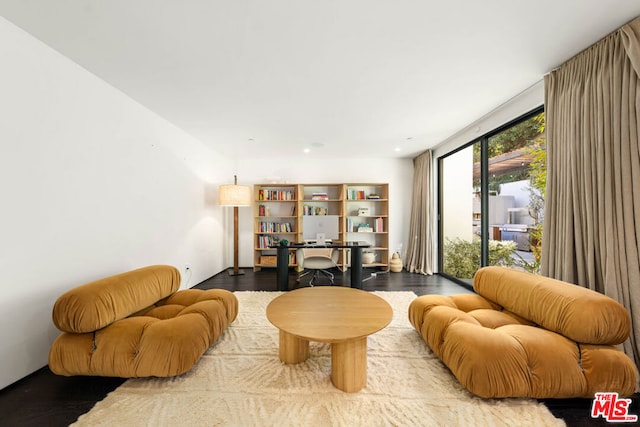 living room with wood-type flooring