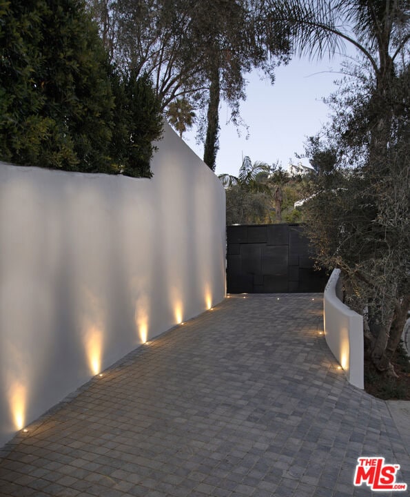 view of patio terrace at dusk