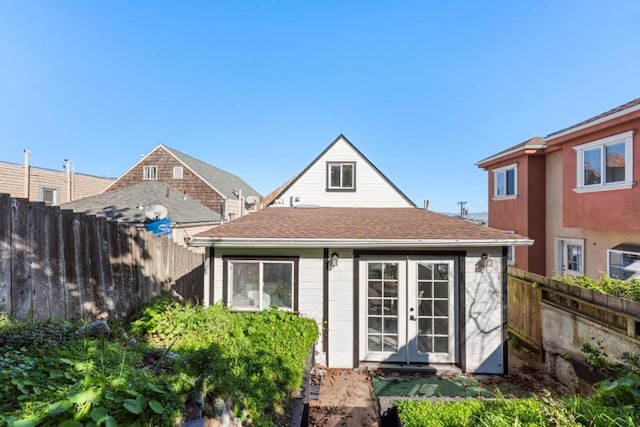 back of property with french doors