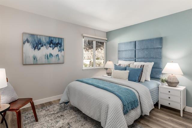 bedroom featuring hardwood / wood-style flooring