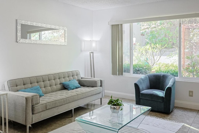 tiled living room with a textured ceiling