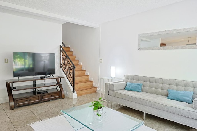 tiled living room with a textured ceiling