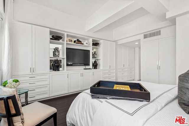 bedroom featuring dark wood-type flooring