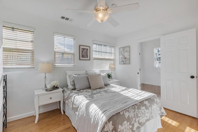 bedroom featuring ceiling fan and light wood-type flooring