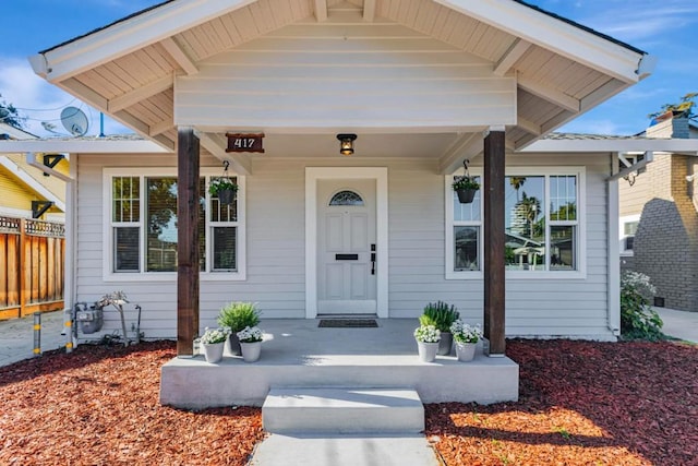 entrance to property with covered porch