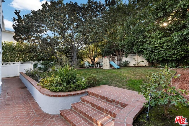 view of patio / terrace featuring a playground