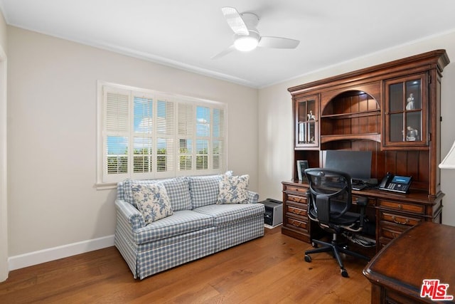 office space with ceiling fan and wood-type flooring