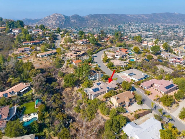 bird's eye view with a mountain view