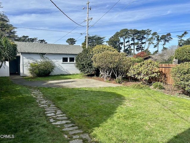 view of yard with a patio area and fence