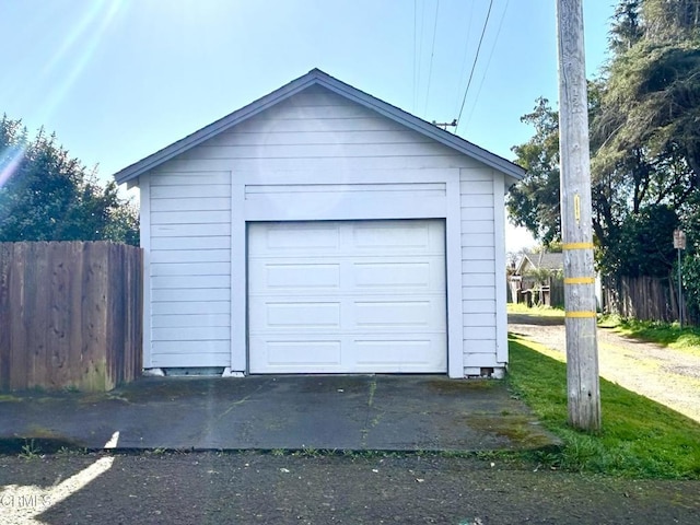 detached garage with fence