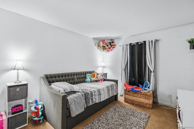 bedroom featuring carpet flooring