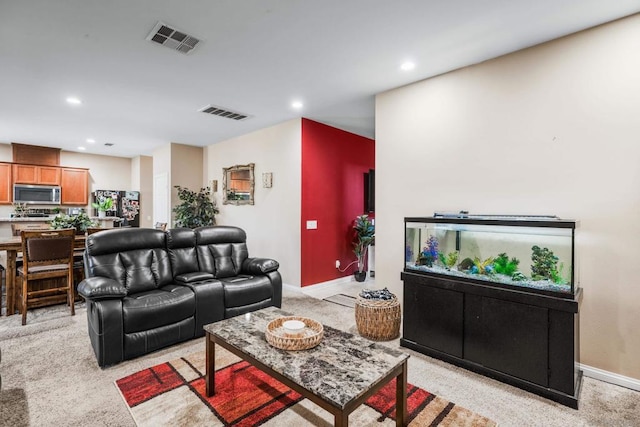 living room with light colored carpet