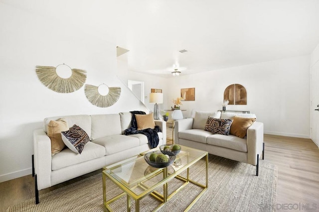 living room with wood-type flooring