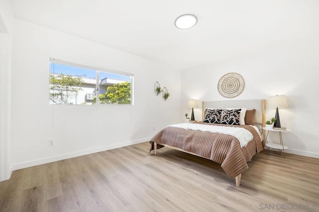 bedroom featuring light hardwood / wood-style flooring