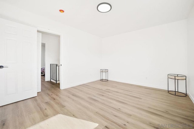 unfurnished room featuring light hardwood / wood-style flooring