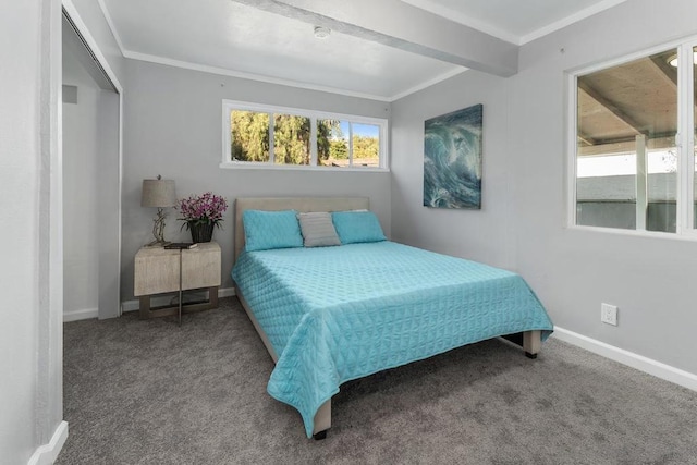 carpeted bedroom with ornamental molding and beam ceiling