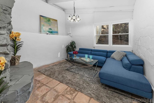 living room with an inviting chandelier and beam ceiling