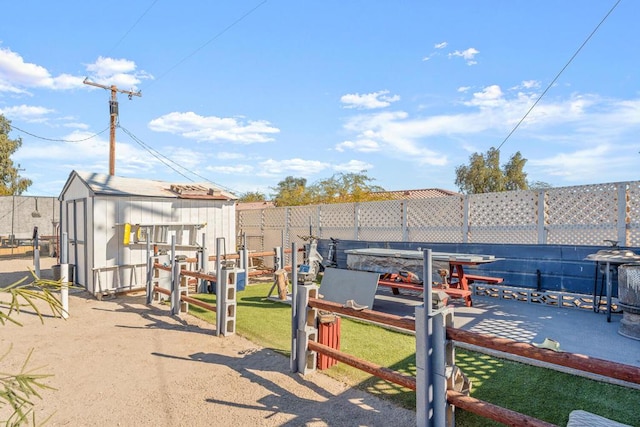 exterior space featuring a storage shed