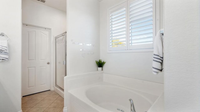 bathroom featuring independent shower and bath and tile patterned floors