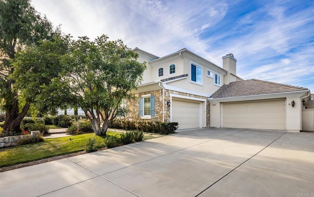 view of front of home with a garage