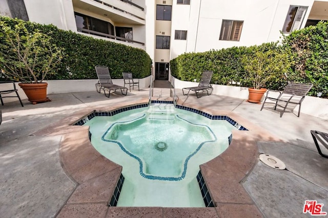 view of pool with a patio