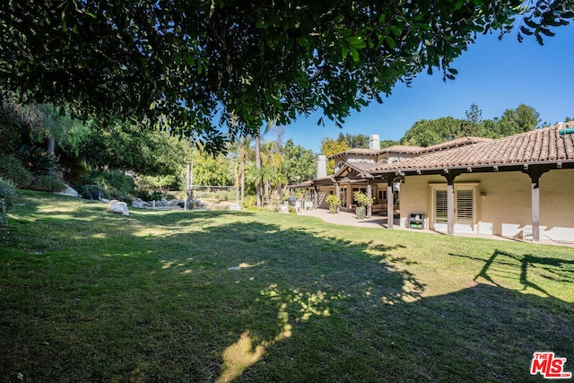 view of yard with a patio area