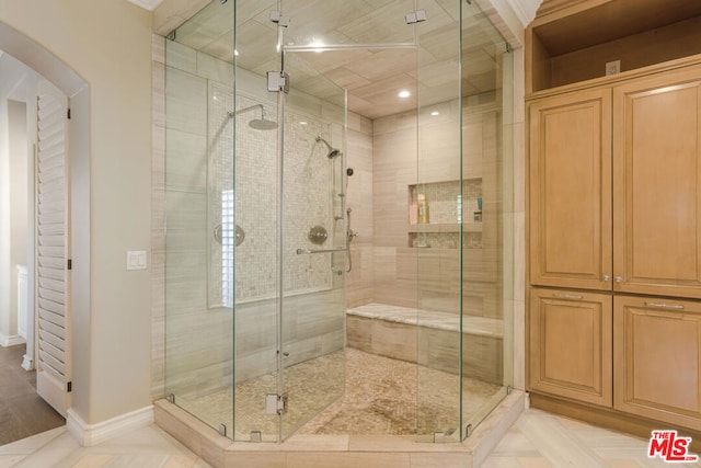 bathroom featuring walk in shower