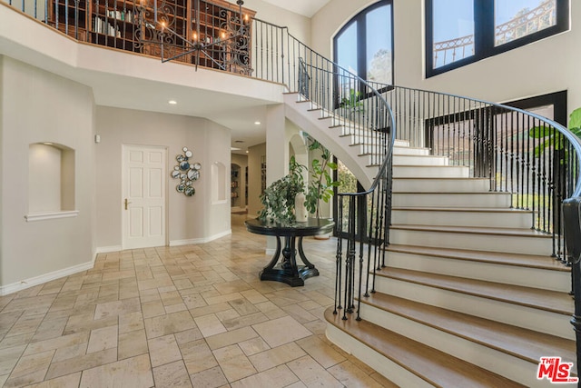 entryway with a high ceiling