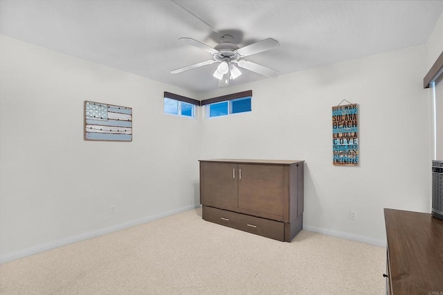 910 N Pacific St Unit 41, Oceanside, CA 92054 - unfurnished bedroom with light colored carpet, baseboards, and a ceiling fan