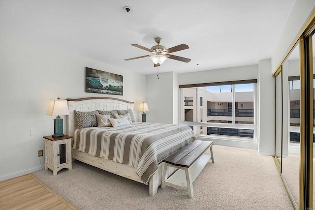 910 N Pacific St Unit 41, Oceanside, CA 92054 - bedroom with baseboards, wood finished floors, and ceiling fan