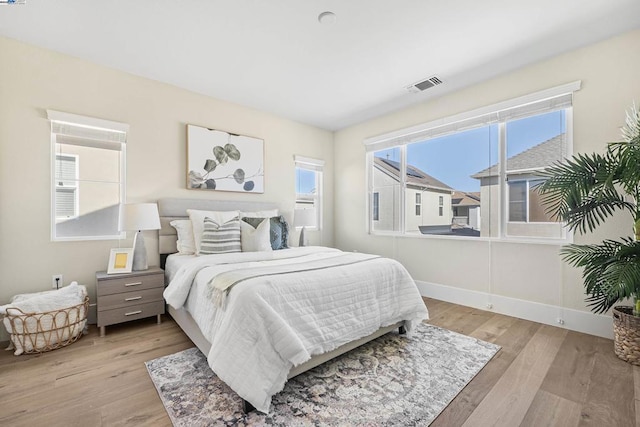 bedroom featuring light hardwood / wood-style flooring