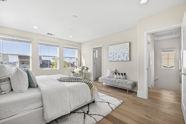 bedroom with light wood-type flooring