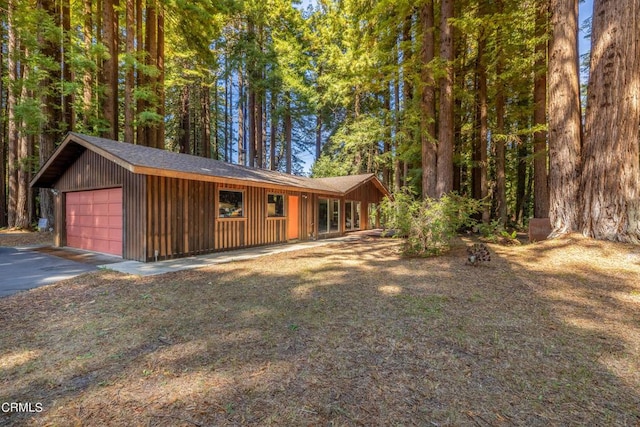 exterior space with a garage