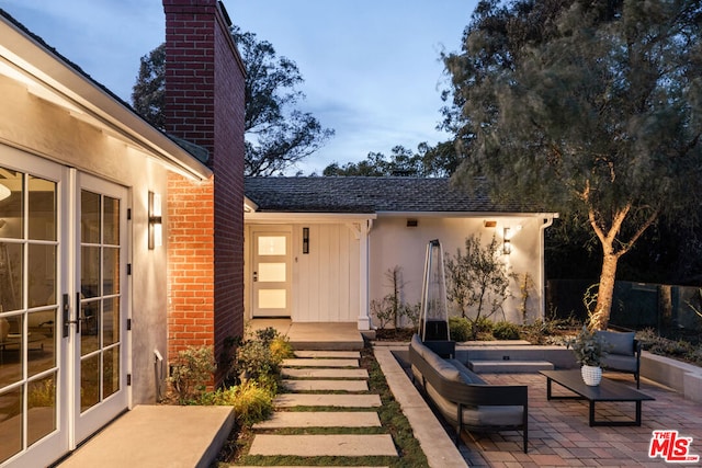 view of patio / terrace featuring french doors