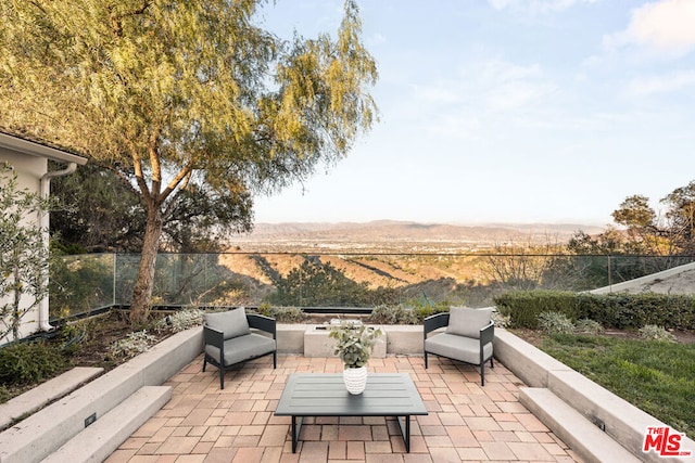 view of patio with a mountain view