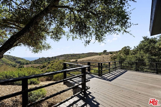 deck with a mountain view