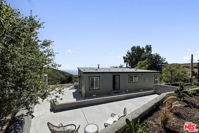 view of front of property with a mountain view