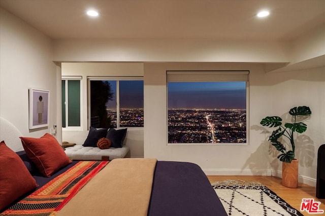 bedroom with light hardwood / wood-style flooring