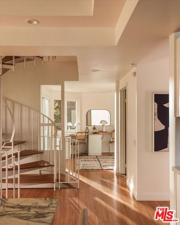 stairway with wood-type flooring