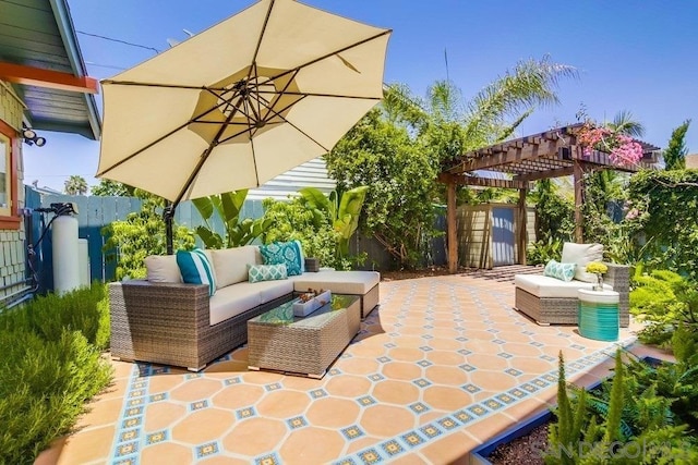 view of patio featuring an outdoor living space and a pergola