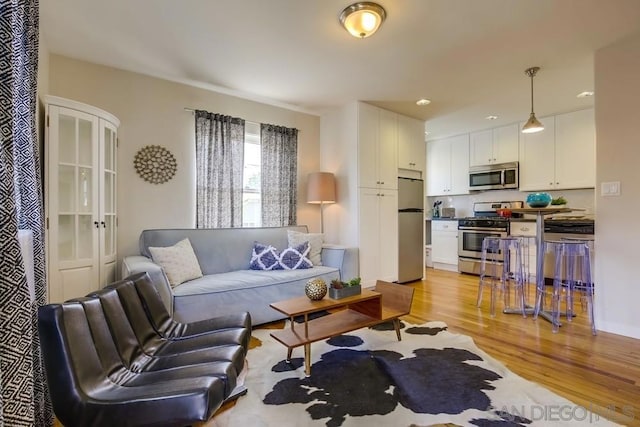 living room featuring light wood-type flooring